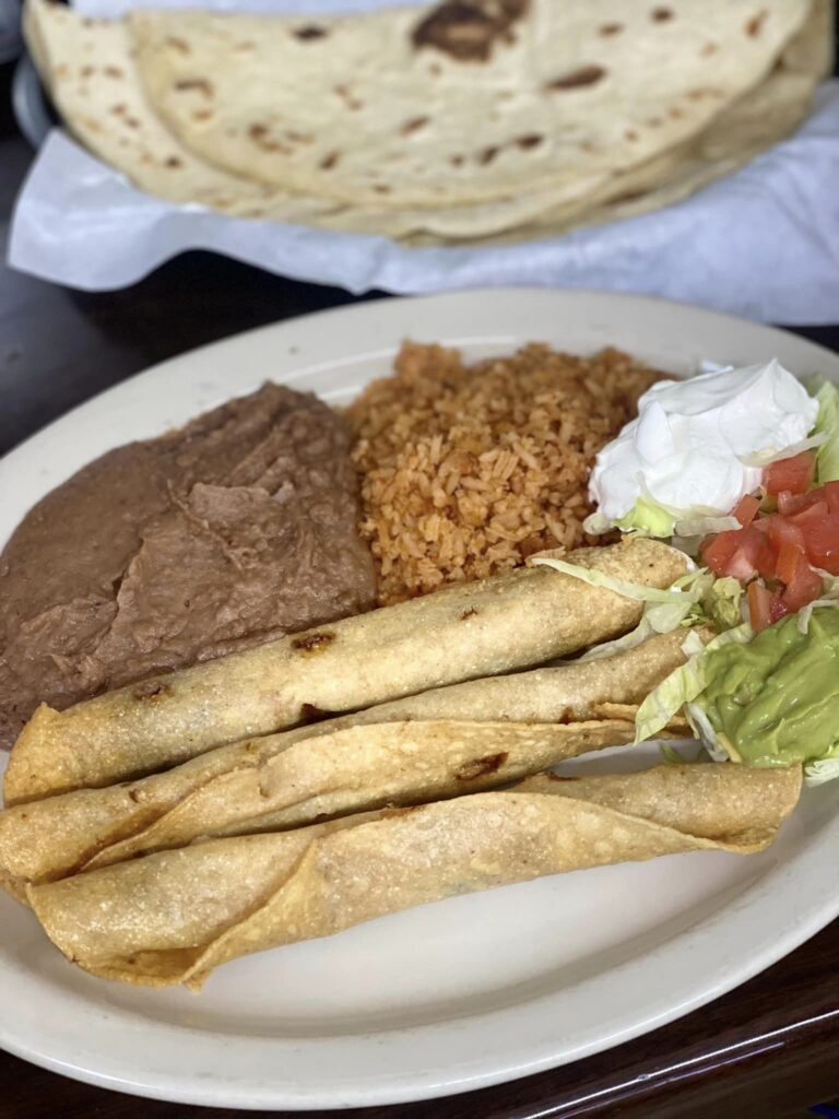 a plate of flautas