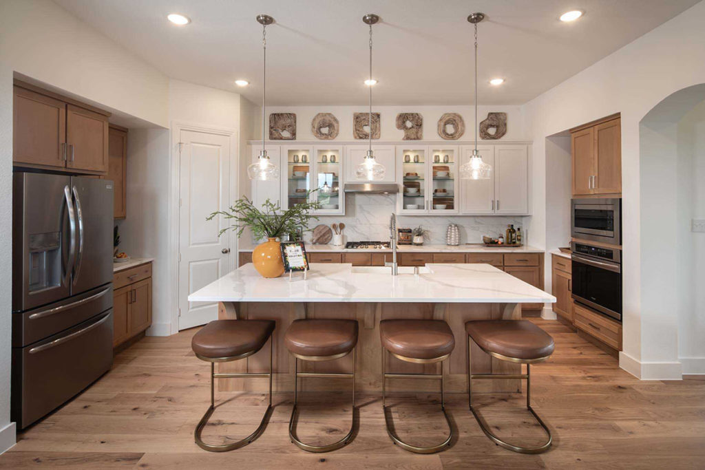 modern kitchen with an island and marble countertops