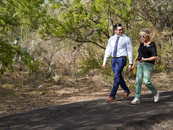 Guests walk along the Madla Greenway at the Grand Opening in VIDA San Antonio