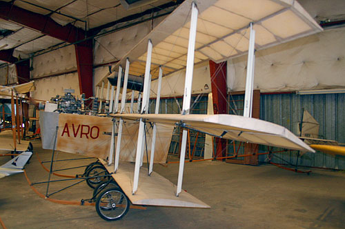 Historic airplane inside of a museum featuring the words "AVRO."