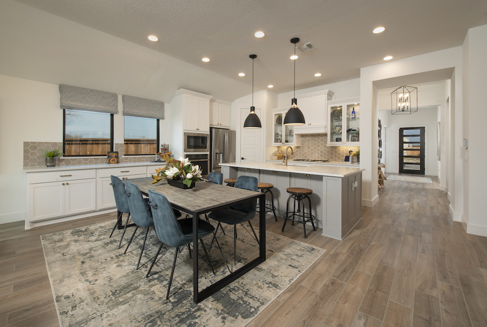 A beautifully upgraded kitchen with natural lighting. 