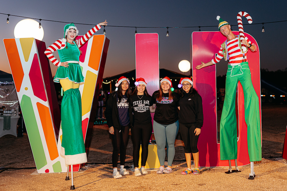 A group of visitors at Light of Esperanze at Texas A&M University - San Antonio