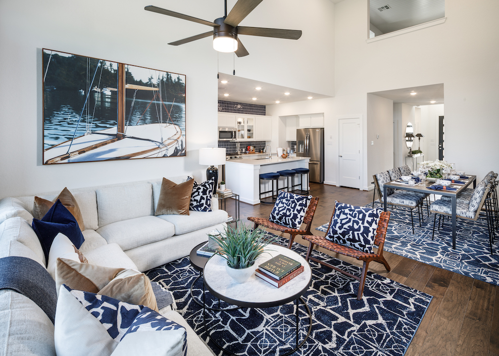 A modern living room with blue accents