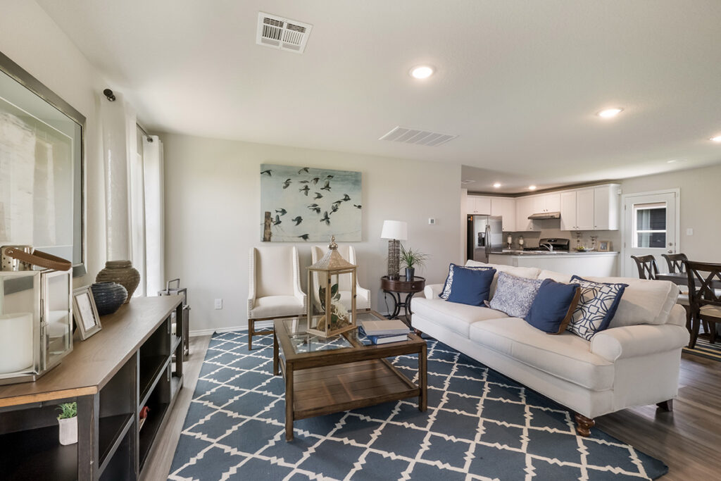 Neutral living room with pops of blue