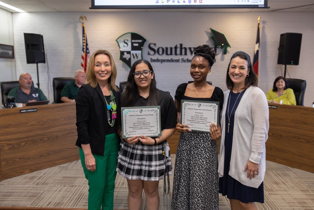 Jeanette Ball, Superintendent of Southwest ISD stands with students to celebrate student achievements