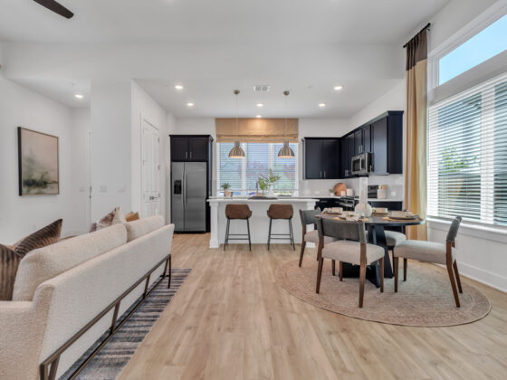 A townhome with wooden floors and natural lighting in a new-build townhome