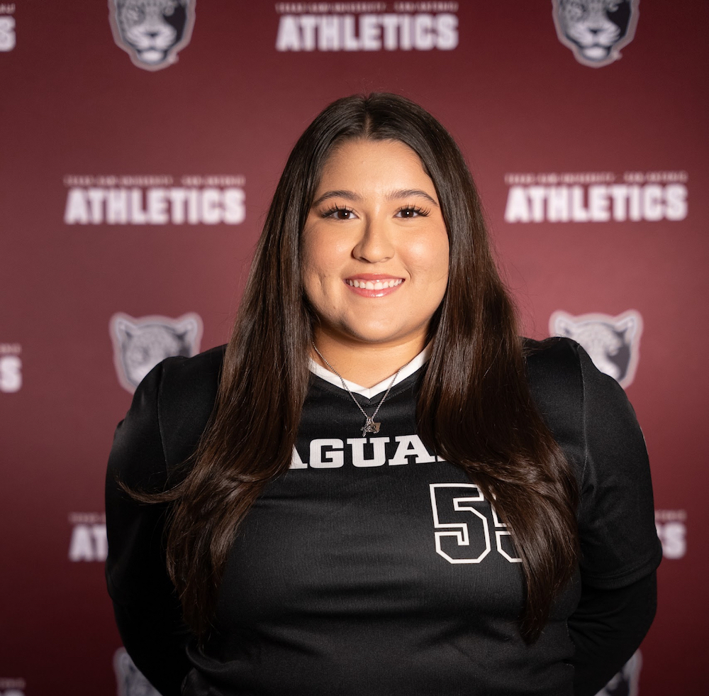 A smiling portrait of Ryanne Limon in her softball uniform