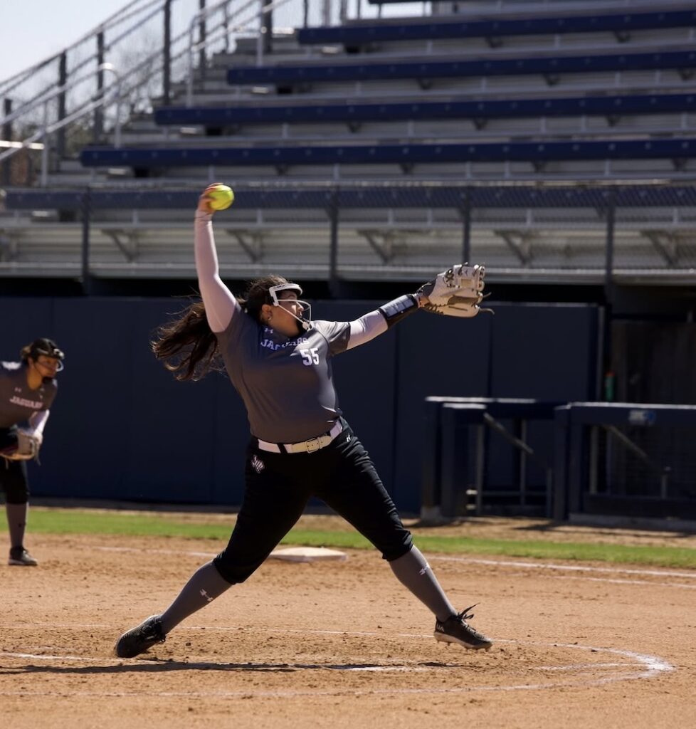 Ryanne Limon pitches a softball at the new TAMUSA track and field