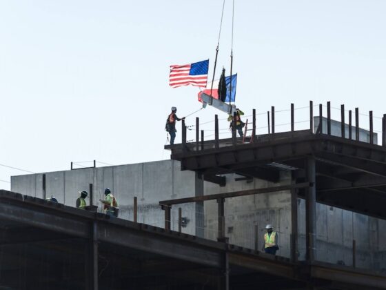 Construction crews lower the beam into place at the site of the forthcoming Palo Alto Hospital on San Antonio's South Side. The hospital is slated to open in 2027.