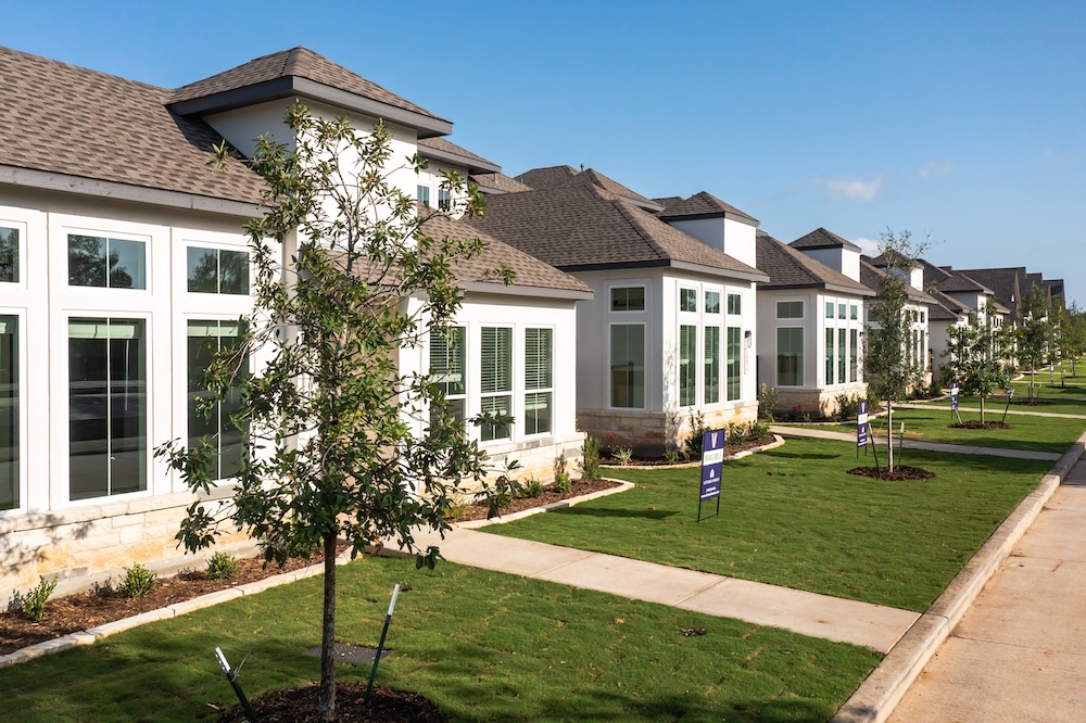 A street view of a row of newly constructed Sitterle Townhomes