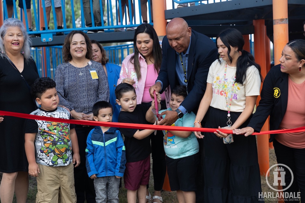 Harlandale Independent School District Superintendent, Geradro Soto attends a ribbon cutting ceremony with students