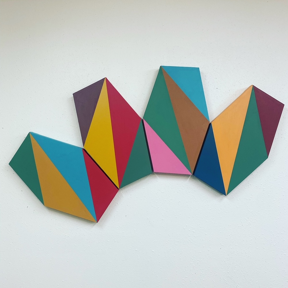 Colorful, geometric art displayed against a solid white background