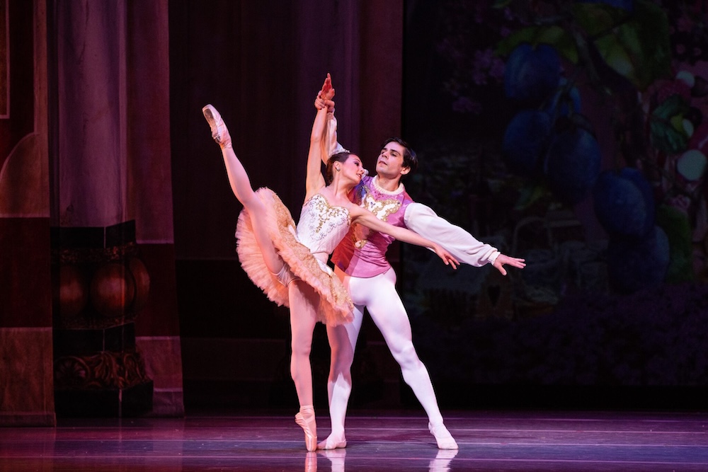 two ballerinas perform the nutcracker on stage during the holidays