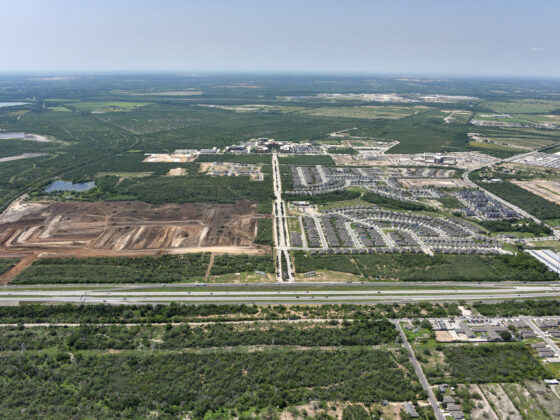 Aerial image showing homes and neighborhood under development in VIDA San Antonio