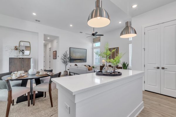 Open concept townhome kitchen with quartz countertops at VIDA San Antonio