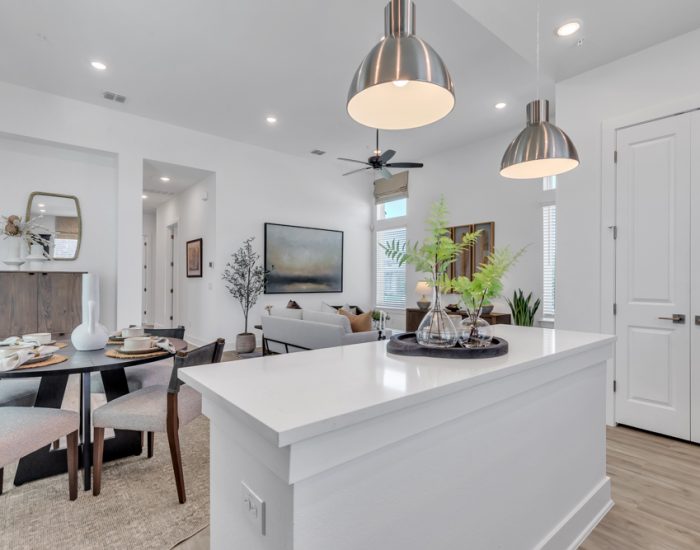 Open concept townhome kitchen with quartz countertops at VIDA San Antonio