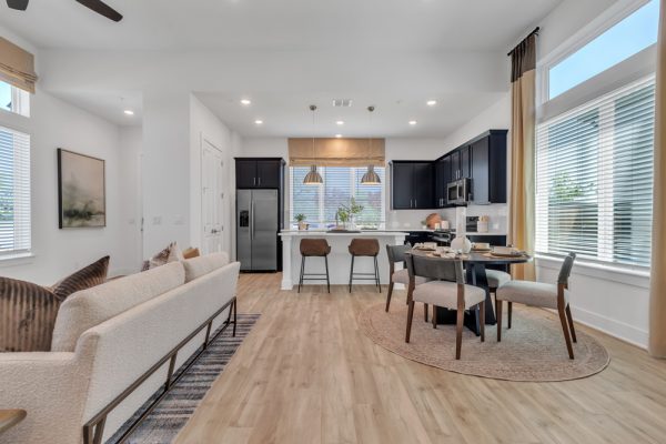A townhome with wooden floors and natural lighting in a new-build townhome