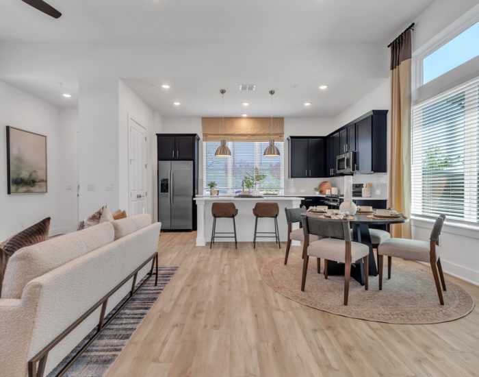 A townhome with wooden floors and natural lighting in a new-build townhome